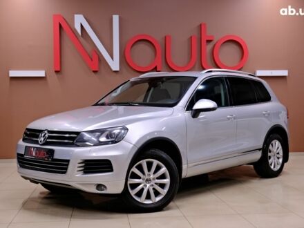 Серый Фольксваген Туарег, объемом двигателя 3 л и пробегом 219 тыс. км за 17900 $, фото 1 на Automoto.ua