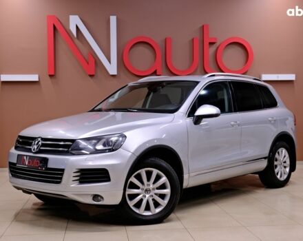 Серый Фольксваген Туарег, объемом двигателя 3 л и пробегом 219 тыс. км за 17900 $, фото 1 на Automoto.ua