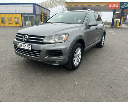 Серый Фольксваген Туарег, объемом двигателя 3.6 л и пробегом 303 тыс. км за 15800 $, фото 1 на Automoto.ua