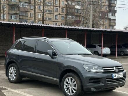 Серый Фольксваген Туарег, объемом двигателя 3 л и пробегом 263 тыс. км за 17000 $, фото 1 на Automoto.ua