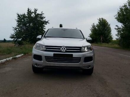 Серый Фольксваген Туарег, объемом двигателя 2.97 л и пробегом 218 тыс. км за 20500 $, фото 1 на Automoto.ua