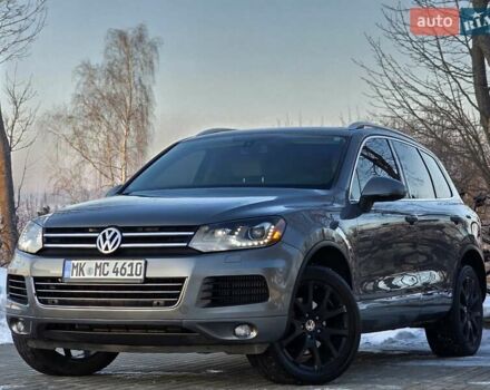 Серый Фольксваген Туарег, объемом двигателя 3 л и пробегом 211 тыс. км за 18700 $, фото 1 на Automoto.ua