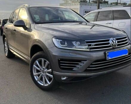 Серый Фольксваген Туарег, объемом двигателя 3 л и пробегом 280 тыс. км за 20500 $, фото 1 на Automoto.ua