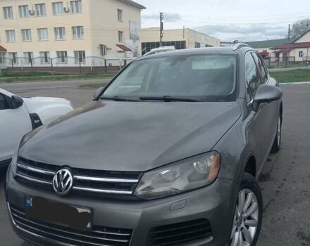 Серый Фольксваген Туарег, объемом двигателя 3 л и пробегом 267 тыс. км за 17500 $, фото 1 на Automoto.ua