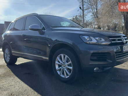 Серый Фольксваген Туарег, объемом двигателя 2.97 л и пробегом 223 тыс. км за 19500 $, фото 1 на Automoto.ua