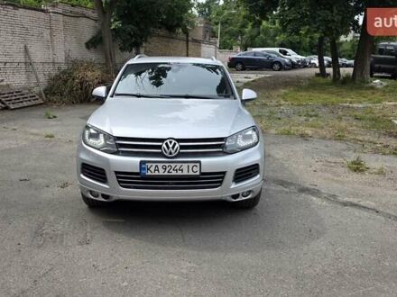 Серый Фольксваген Туарег, объемом двигателя 3 л и пробегом 275 тыс. км за 20500 $, фото 1 на Automoto.ua