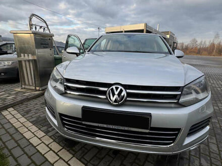 Серый Фольксваген Туарег, объемом двигателя 3 л и пробегом 239 тыс. км за 19200 $, фото 1 на Automoto.ua