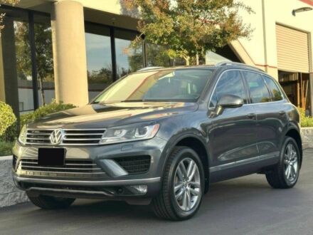 Серый Фольксваген Туарег, объемом двигателя 3 л и пробегом 72 тыс. км за 13600 $, фото 1 на Automoto.ua