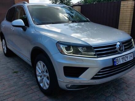 Серый Фольксваген Туарег, объемом двигателя 3 л и пробегом 172 тыс. км за 23200 $, фото 1 на Automoto.ua