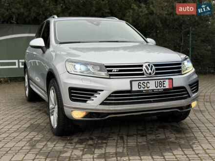 Серый Фольксваген Туарег, объемом двигателя 3 л и пробегом 235 тыс. км за 27500 $, фото 1 на Automoto.ua