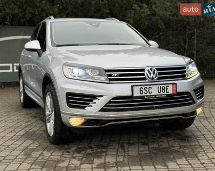 Серый Фольксваген Туарег, объемом двигателя 3 л и пробегом 235 тыс. км за 27500 $, фото 1 на Automoto.ua