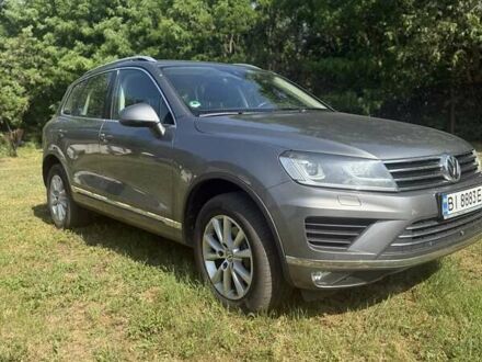 Серый Фольксваген Туарег, объемом двигателя 3 л и пробегом 223 тыс. км за 30000 $, фото 1 на Automoto.ua