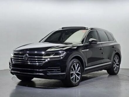 Серый Фольксваген Туарег, объемом двигателя 3 л и пробегом 88 тыс. км за 51200 $, фото 1 на Automoto.ua