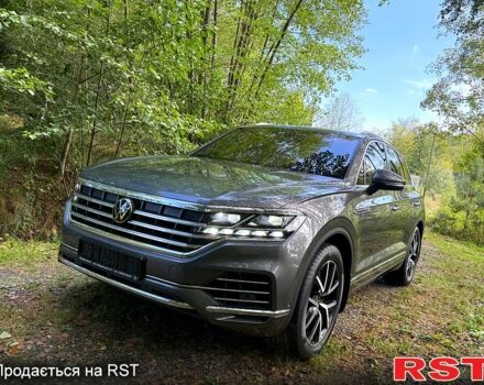 Сірий Фольксваген Туарег, об'ємом двигуна 3 л та пробігом 62 тис. км за 58500 $, фото 1 на Automoto.ua