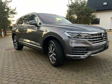 Серый Фольксваген Туарег, объемом двигателя 3 л и пробегом 14 тыс. км за 40000 $, фото 1 на Automoto.ua