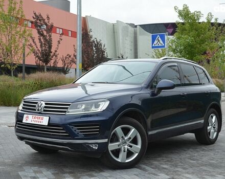 Синій Фольксваген Туарег, об'ємом двигуна 3 л та пробігом 144 тис. км за 23700 $, фото 1 на Automoto.ua