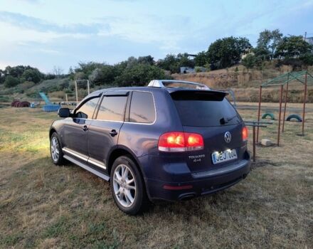 Синий Фольксваген Туарег, объемом двигателя 3 л и пробегом 300 тыс. км за 6200 $, фото 1 на Automoto.ua