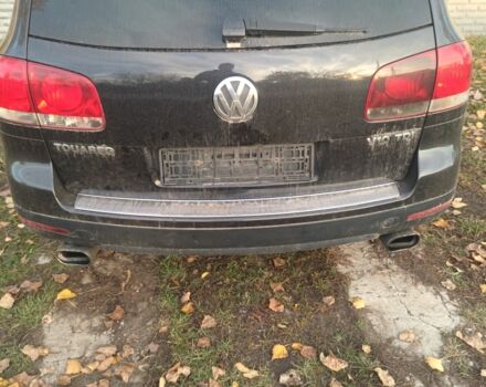 Синий Фольксваген Туарег, объемом двигателя 5 л и пробегом 210 тыс. км за 3783 $, фото 1 на Automoto.ua