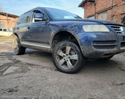 Синий Фольксваген Туарег, объемом двигателя 5 л и пробегом 400 тыс. км за 4662 $, фото 1 на Automoto.ua