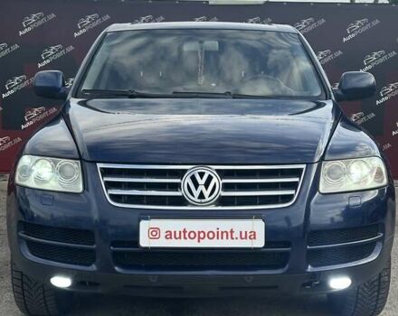 Синий Фольксваген Туарег, объемом двигателя 2.46 л и пробегом 264 тыс. км за 9700 $, фото 1 на Automoto.ua