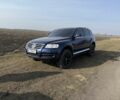 Синий Фольксваген Туарег, объемом двигателя 3 л и пробегом 250 тыс. км за 6000 $, фото 1 на Automoto.ua