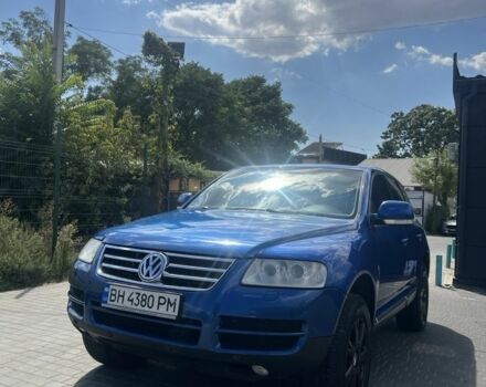 Синий Фольксваген Туарег, объемом двигателя 3 л и пробегом 377 тыс. км за 8700 $, фото 4 на Automoto.ua