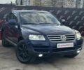 Синий Фольксваген Туарег, объемом двигателя 2.46 л и пробегом 264 тыс. км за 9700 $, фото 2 на Automoto.ua