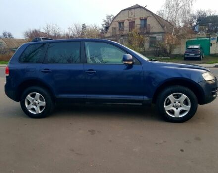 Синій Фольксваген Туарег, об'ємом двигуна 3 л та пробігом 300 тис. км за 9500 $, фото 3 на Automoto.ua