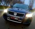Синій Фольксваген Туарег, об'ємом двигуна 3 л та пробігом 300 тис. км за 9500 $, фото 1 на Automoto.ua