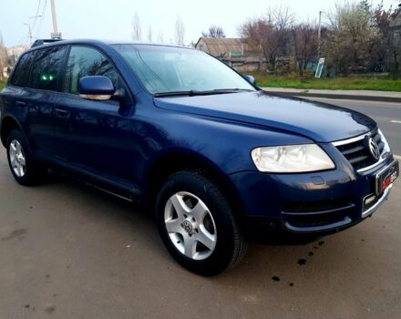 Синій Фольксваген Туарег, об'ємом двигуна 3 л та пробігом 300 тис. км за 9500 $, фото 4 на Automoto.ua