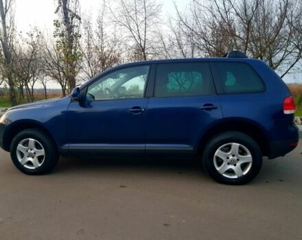 Синій Фольксваген Туарег, об'ємом двигуна 3 л та пробігом 300 тис. км за 9500 $, фото 5 на Automoto.ua