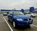 Синий Фольксваген Туарег, объемом двигателя 3 л и пробегом 430 тыс. км за 6008 $, фото 1 на Automoto.ua