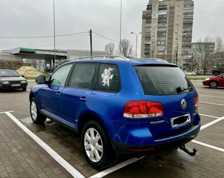 Синий Фольксваген Туарег, объемом двигателя 3 л и пробегом 430 тыс. км за 6008 $, фото 4 на Automoto.ua