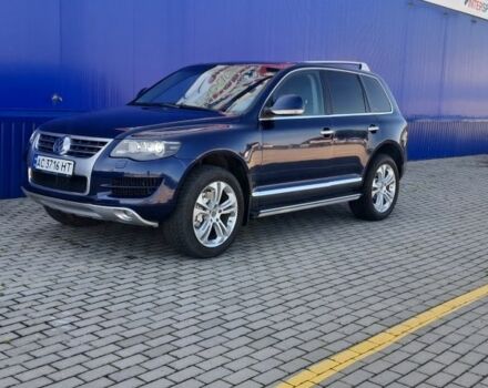 Синий Фольксваген Туарег, объемом двигателя 4.2 л и пробегом 210 тыс. км за 7500 $, фото 1 на Automoto.ua