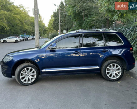 Синій Фольксваген Туарег, об'ємом двигуна 3 л та пробігом 306 тис. км за 12500 $, фото 5 на Automoto.ua