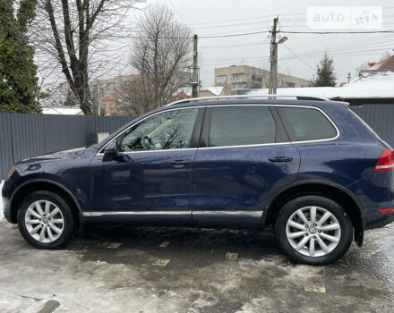 Синий Фольксваген Туарег, объемом двигателя 3 л и пробегом 201 тыс. км за 15500 $, фото 2 на Automoto.ua