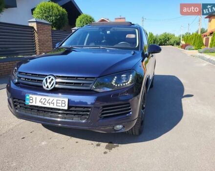 Синий Фольксваген Туарег, объемом двигателя 2.97 л и пробегом 221 тыс. км за 21400 $, фото 1 на Automoto.ua