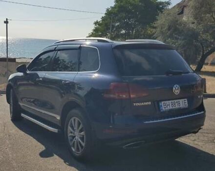 Синий Фольксваген Туарег, объемом двигателя 2.97 л и пробегом 325 тыс. км за 21500 $, фото 1 на Automoto.ua