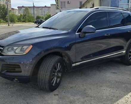 Синий Фольксваген Туарег, объемом двигателя 3 л и пробегом 214 тыс. км за 17900 $, фото 1 на Automoto.ua