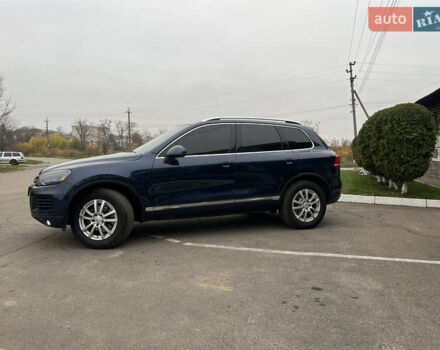 Синий Фольксваген Туарег, объемом двигателя 2.97 л и пробегом 257 тыс. км за 17850 $, фото 4 на Automoto.ua