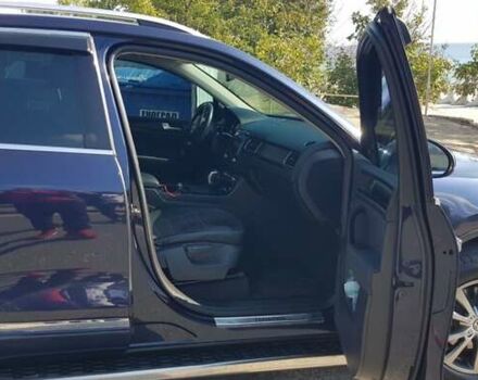 Синий Фольксваген Туарег, объемом двигателя 2.97 л и пробегом 325 тыс. км за 21500 $, фото 22 на Automoto.ua