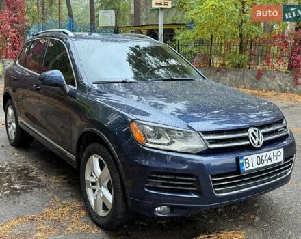Синий Фольксваген Туарег, объемом двигателя 3 л и пробегом 127 тыс. км за 15999 $, фото 2 на Automoto.ua