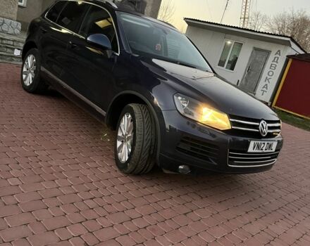 Синий Фольксваген Туарег, объемом двигателя 3 л и пробегом 150 тыс. км за 8595 $, фото 1 на Automoto.ua