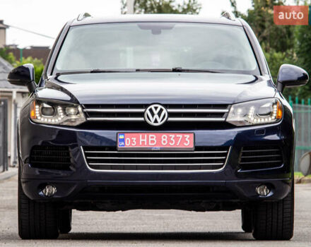 Синий Фольксваген Туарег, объемом двигателя 3 л и пробегом 211 тыс. км за 15700 $, фото 2 на Automoto.ua