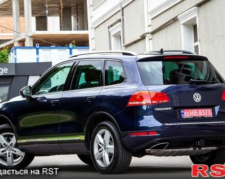 Синий Фольксваген Туарег, объемом двигателя 3 л и пробегом 211 тыс. км за 15700 $, фото 2 на Automoto.ua