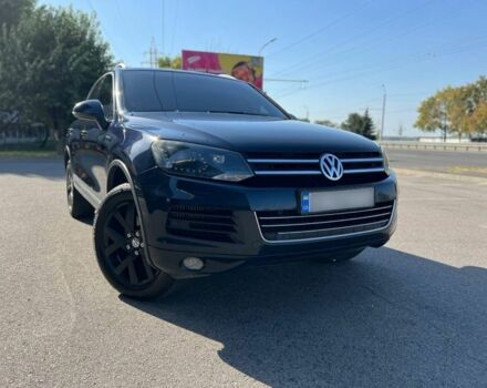 Синий Фольксваген Туарег, объемом двигателя 3 л и пробегом 250 тыс. км за 23500 $, фото 1 на Automoto.ua