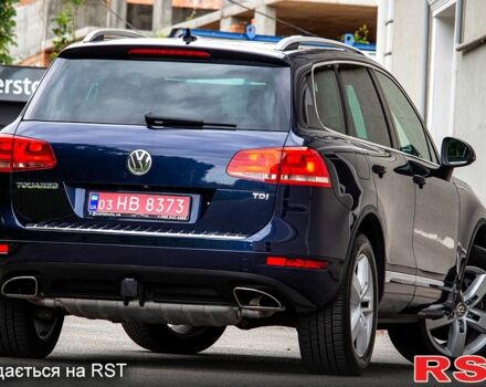 Синий Фольксваген Туарег, объемом двигателя 3 л и пробегом 211 тыс. км за 15700 $, фото 3 на Automoto.ua