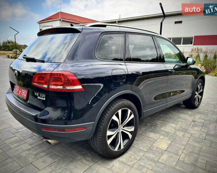 Синий Фольксваген Туарег, объемом двигателя 3 л и пробегом 182 тыс. км за 24900 $, фото 5 на Automoto.ua