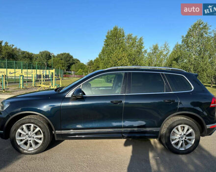 Синий Фольксваген Туарег, объемом двигателя 2.97 л и пробегом 245 тыс. км за 26000 $, фото 2 на Automoto.ua