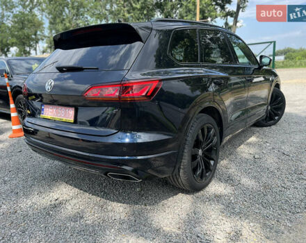 Синій Фольксваген Туарег, об'ємом двигуна 4 л та пробігом 144 тис. км за 52900 $, фото 2 на Automoto.ua